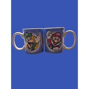 Mug In excellent vintage condition.  Stamped 2002 Nintendo.  Please look at the